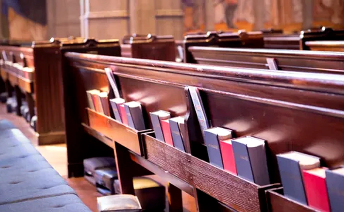 Church pews with books