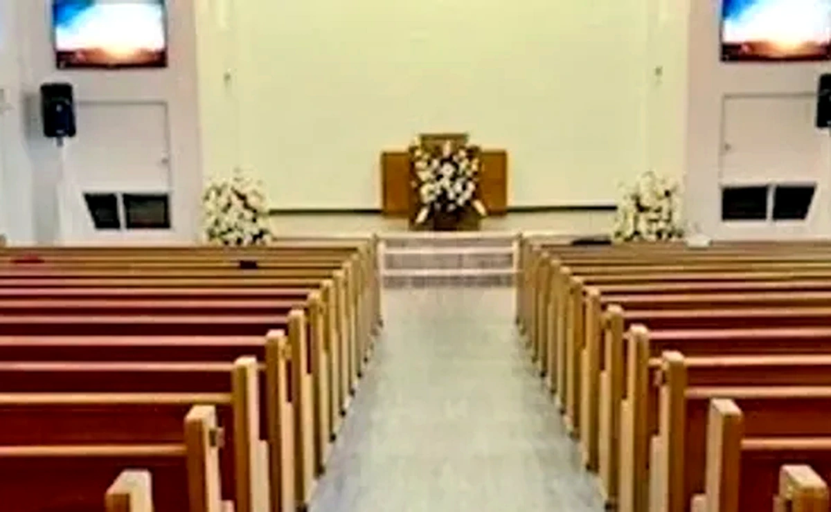 Church sanctuary with pews and altar
